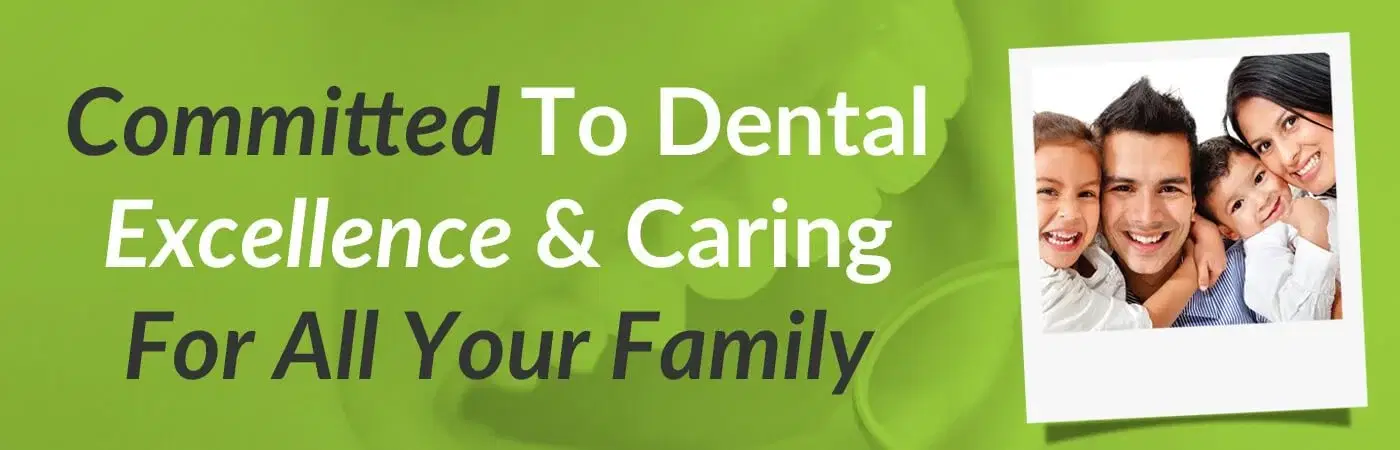 Smiling family of four promoting family dental care at Wightwick Dental Practice in Wolverhampton